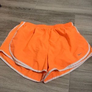 Orange and white nike shorts